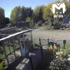Камеры наблюдения сняли как медведь пытается загрызть собаку в посёлке, где...