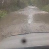 Детей везут в школу буквально по реке. Такая обстановка сейчас на богословской дороге.