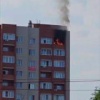 Квартира загорелась на самом верхнем этаже многоэтажки на...