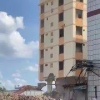 Здание рухнуло на экскаватор во время сноса в китайском городе Гуанси....