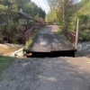В Слизнево рухнул мост после ливней. В посёлке под Дивногорском вода в реке...