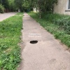 Напротив дома 4 квартала 33 провал большой по пешеходной...