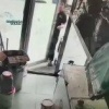 Продавца в Китае взрывом выбросило из магазина и сорвало с него одежду...