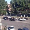 Компания молодых людей остановилась на проезжей части улицы Кочетова и...
