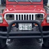 Японец провалил техосмотр на Jeep Wrangler из-за фар, которые выступали за кузов буквально на несколько сантиметров.