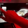 В Tesla Roadster при включении задней передачи на экране камеры появляется ёжик, который протирает объектив перед парковкой.