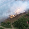 Свердловские огнеборцы ликвидируют возгорание отходов лесопиления в поселке...